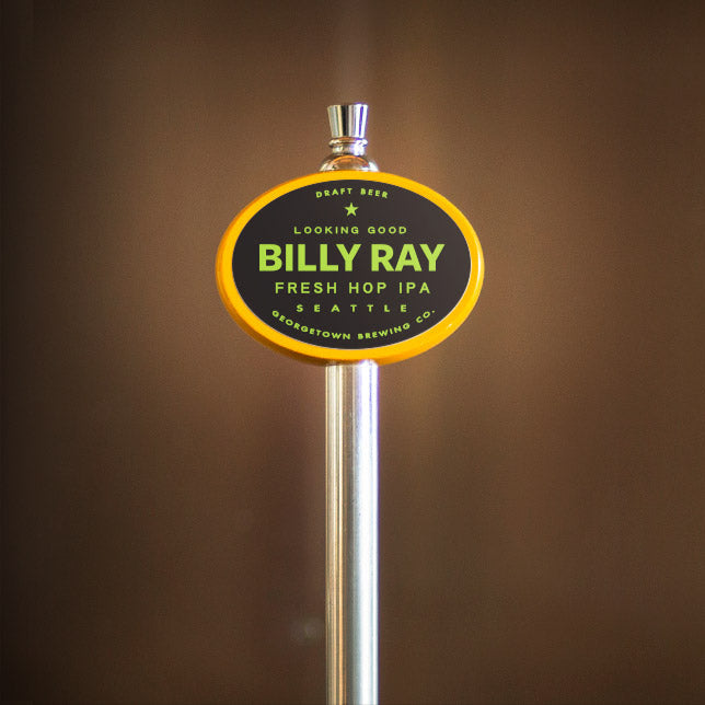 Beer tap handle with 'Billy Ray' branding against a brown background