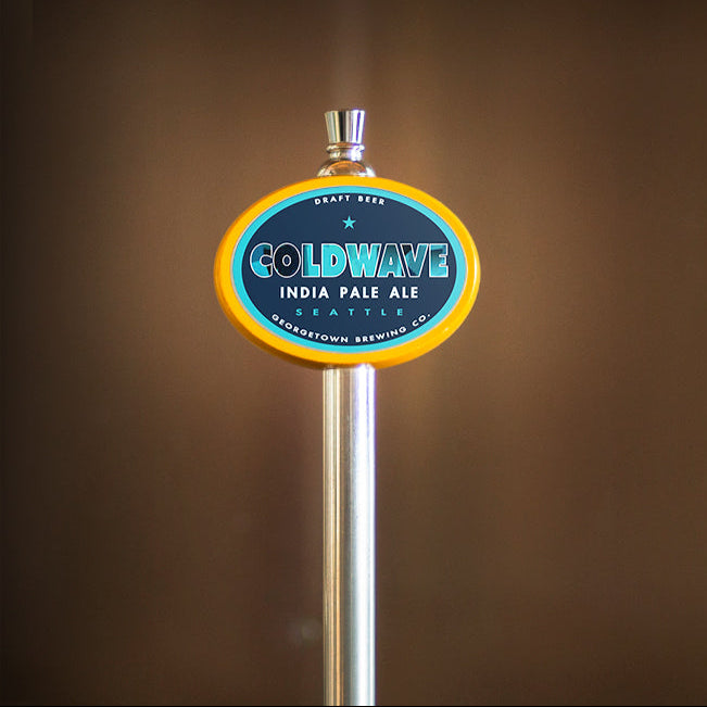 yellow oval tap handle with coldwave tap label