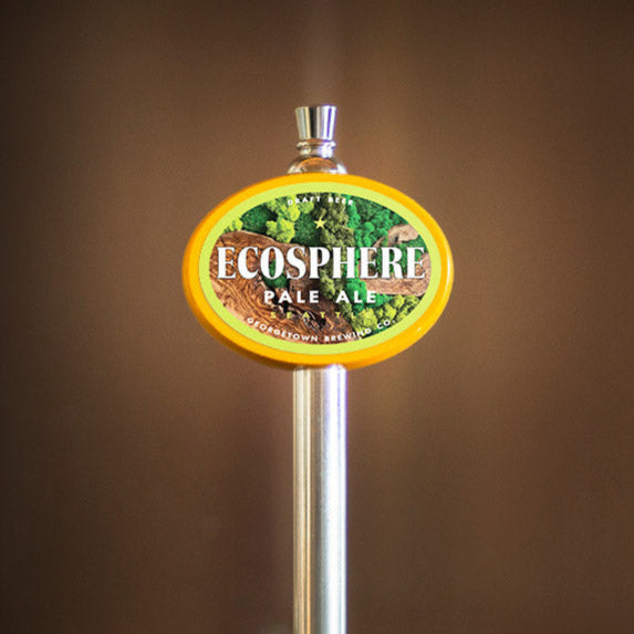 tap handle with the ecosphere label featuring images of varying green mosses.