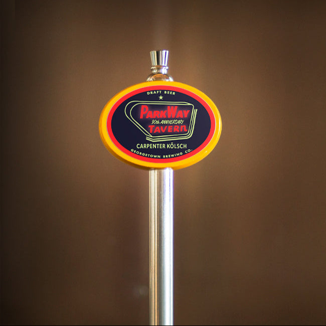 Yellow oval tap handle with Carpenter Kolsch tap label