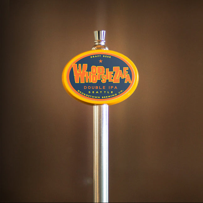 Beer tap handle with 'Whoopsiezafa' logo on a brown background
