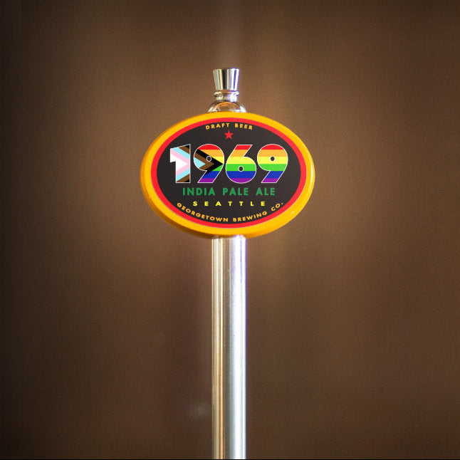 yellow oval tap handle with 1969 tap label