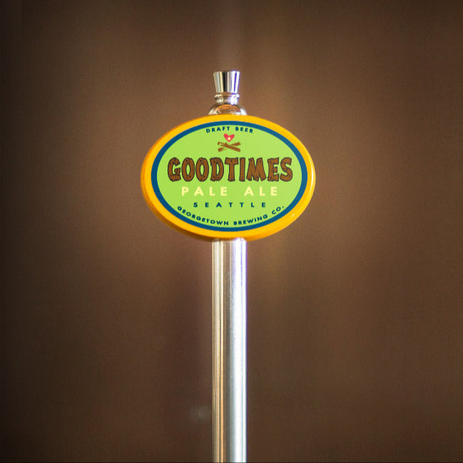 Goodtimes Pale Ale tap handle against a brown background