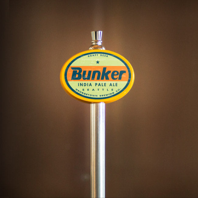 yellow oval with bunker tap label