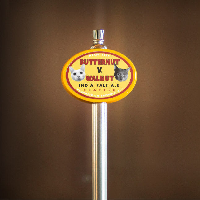 yellow oval tap handle with butternut v walnut tap label