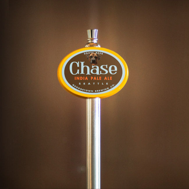 yellow oval tap handle with Chase IPA tap label