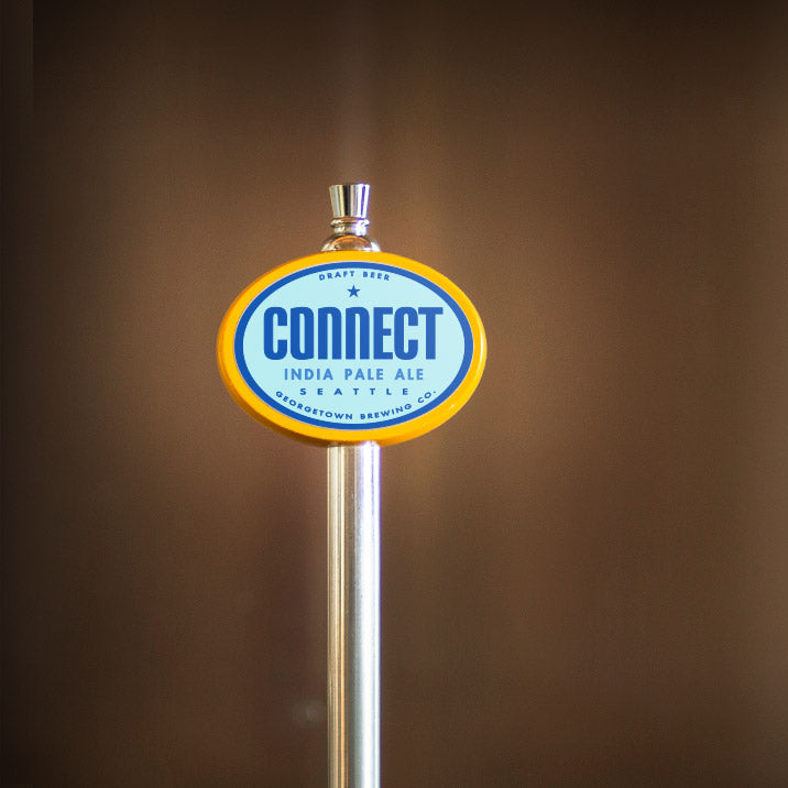 yellow oval tap handle with connect ipa tap label