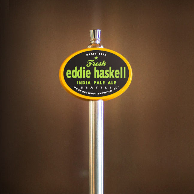 Eddie Haskell India Pale Ale tap handle against a brown background
