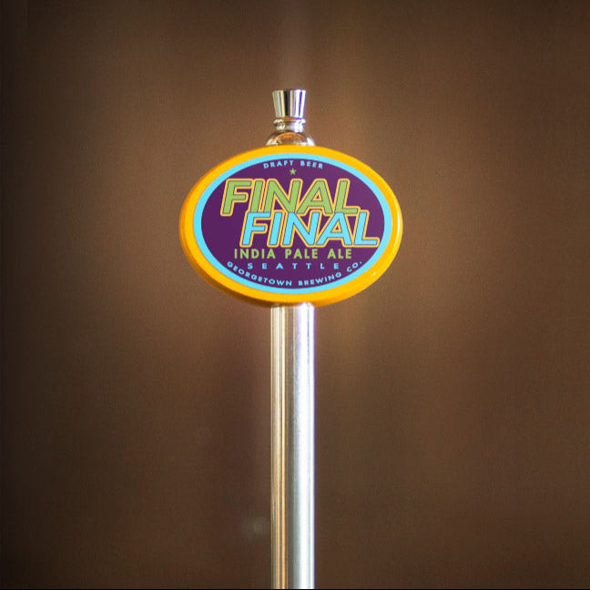 Beer tap handle with 'Final Final' branding against a brown background
