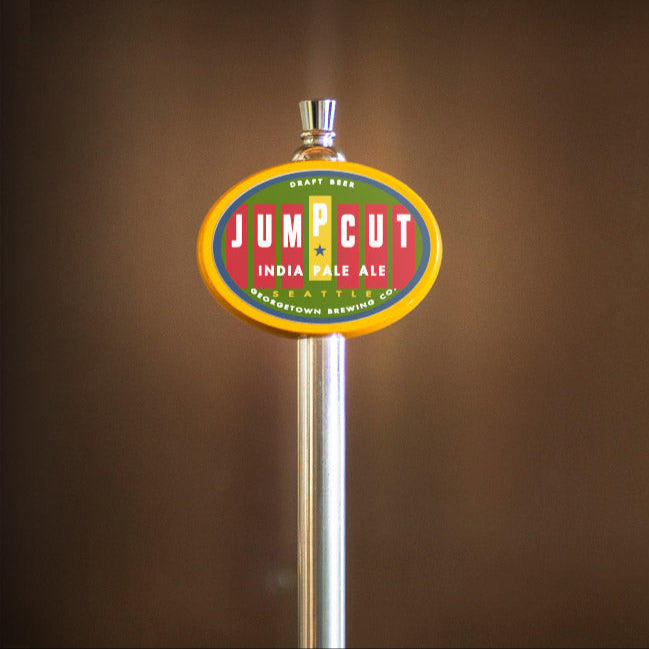 Jumpcut India Pale Ale tap handle against a brown background