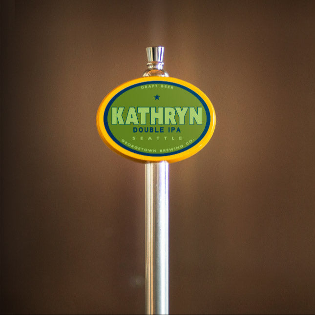 Beer tap handle with 'Kathryn' branding on a brown background