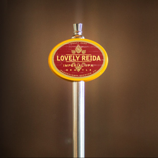 Beer tap handle with 'Lovely Reida' label on a brown background