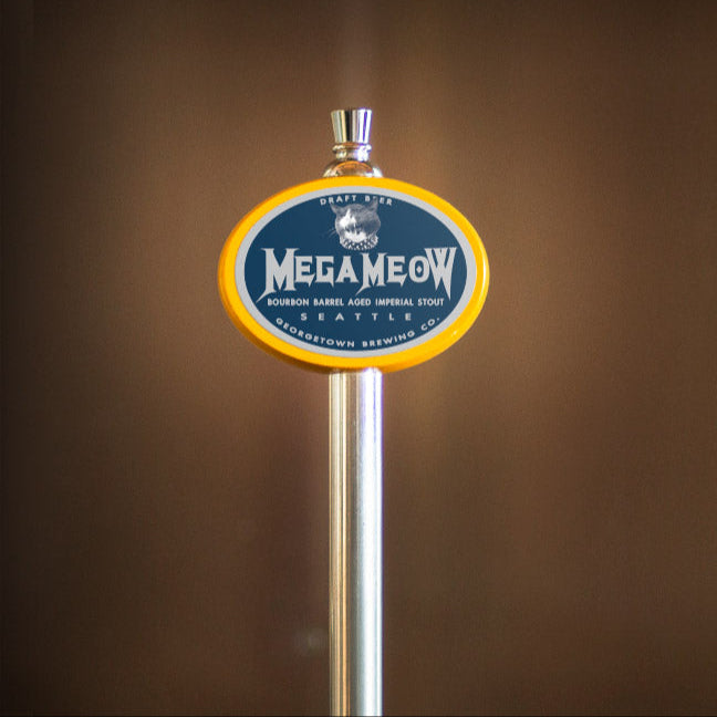 yellow oval tap handle with barrel aged mega meow label