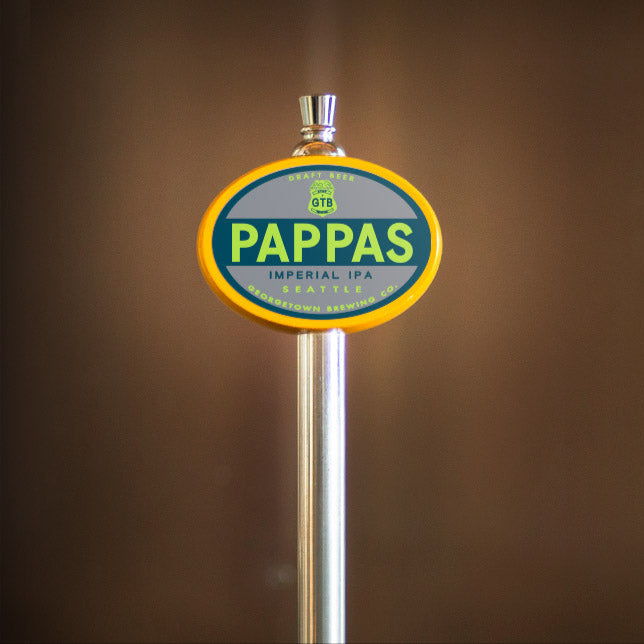 Pappas Imperial IPA tap handle against a brown background