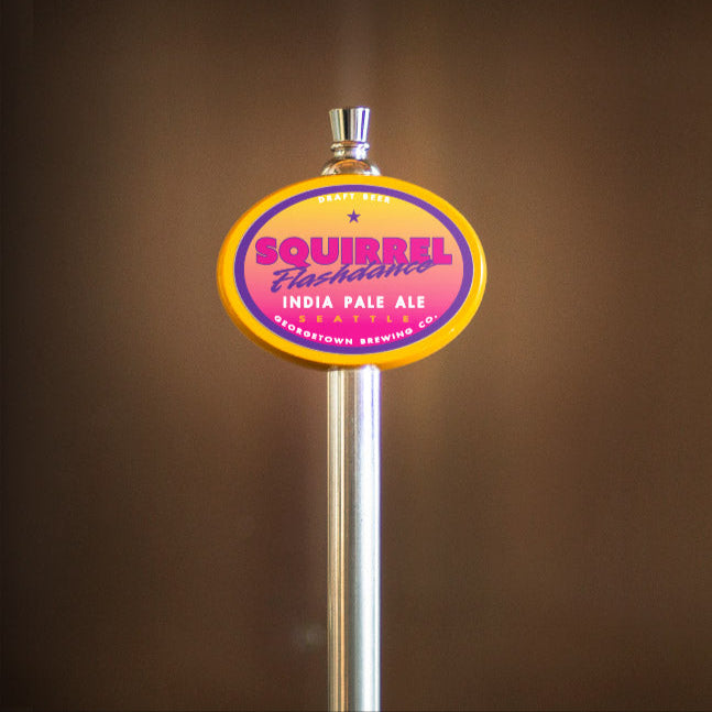 Squirrel Flashdance India Pale Ale tap handle against a brown background