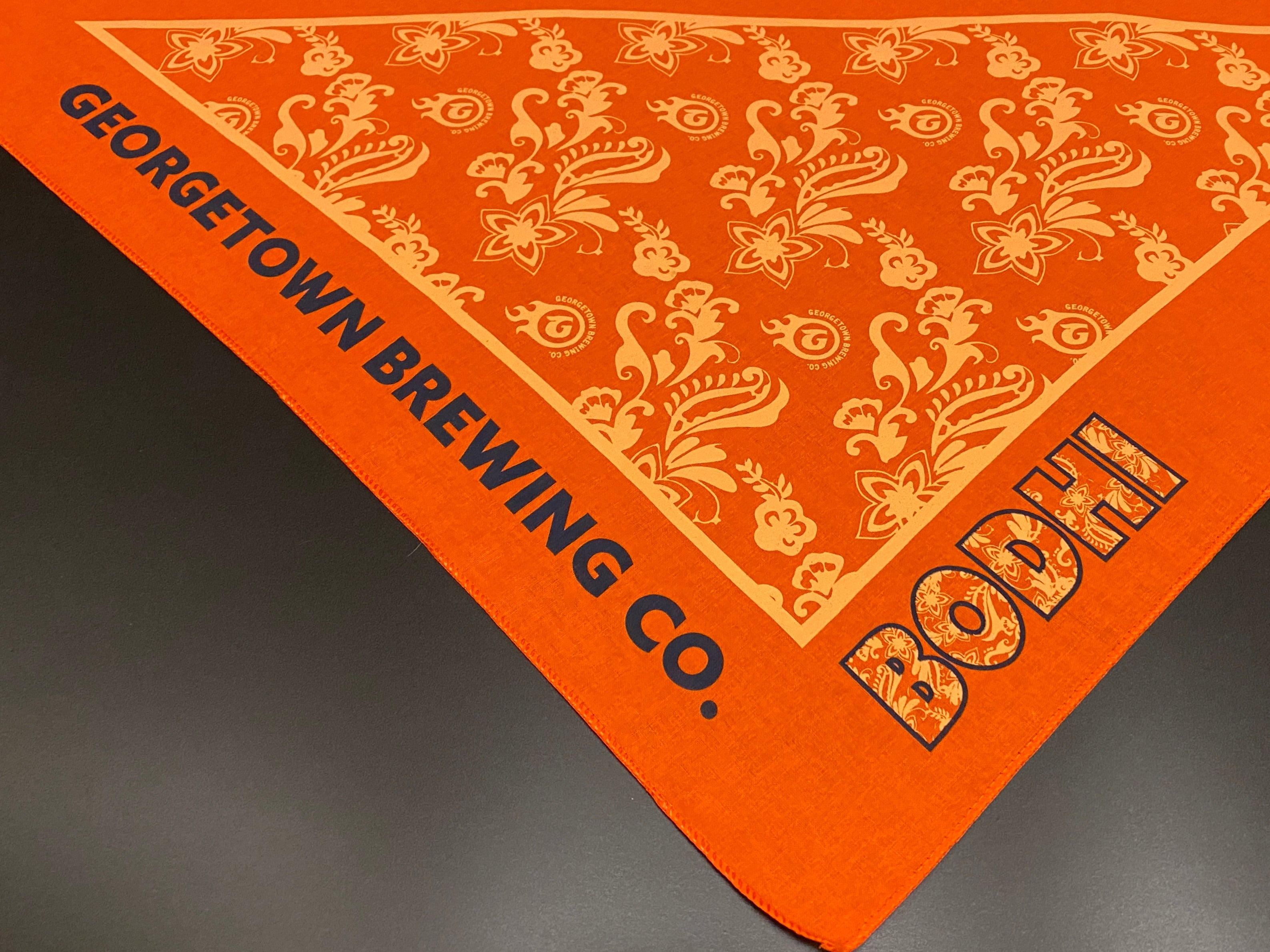 Orange bandana with Georgetown Brewing Co. branding and the name Bodhi