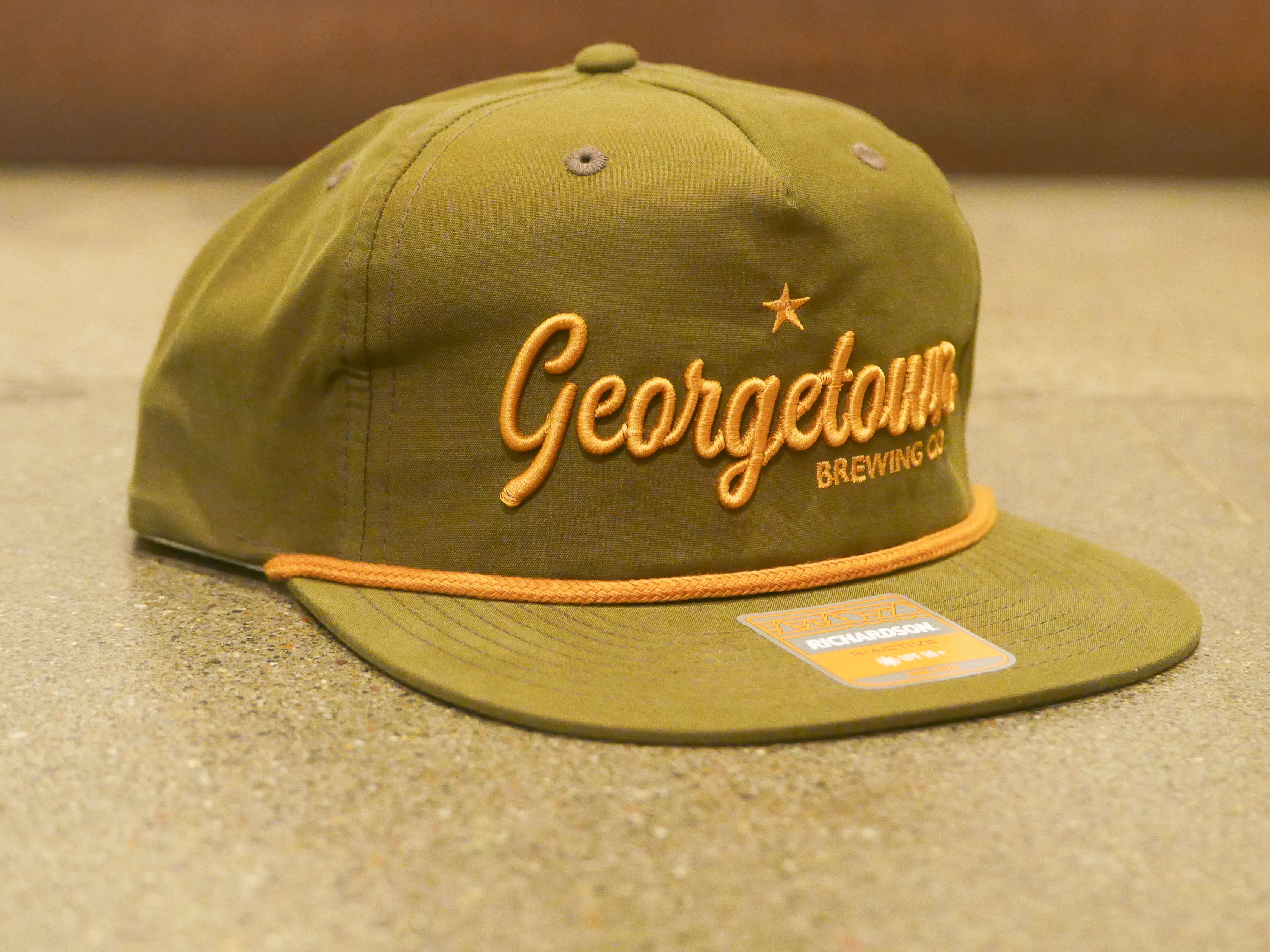 a Hat with 3d embroidered Georgetown Brewing Co. on the front