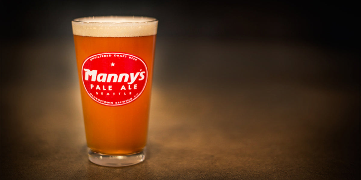 a delicious glass of manny's pale ale on the rustic floor at georgetown brewery