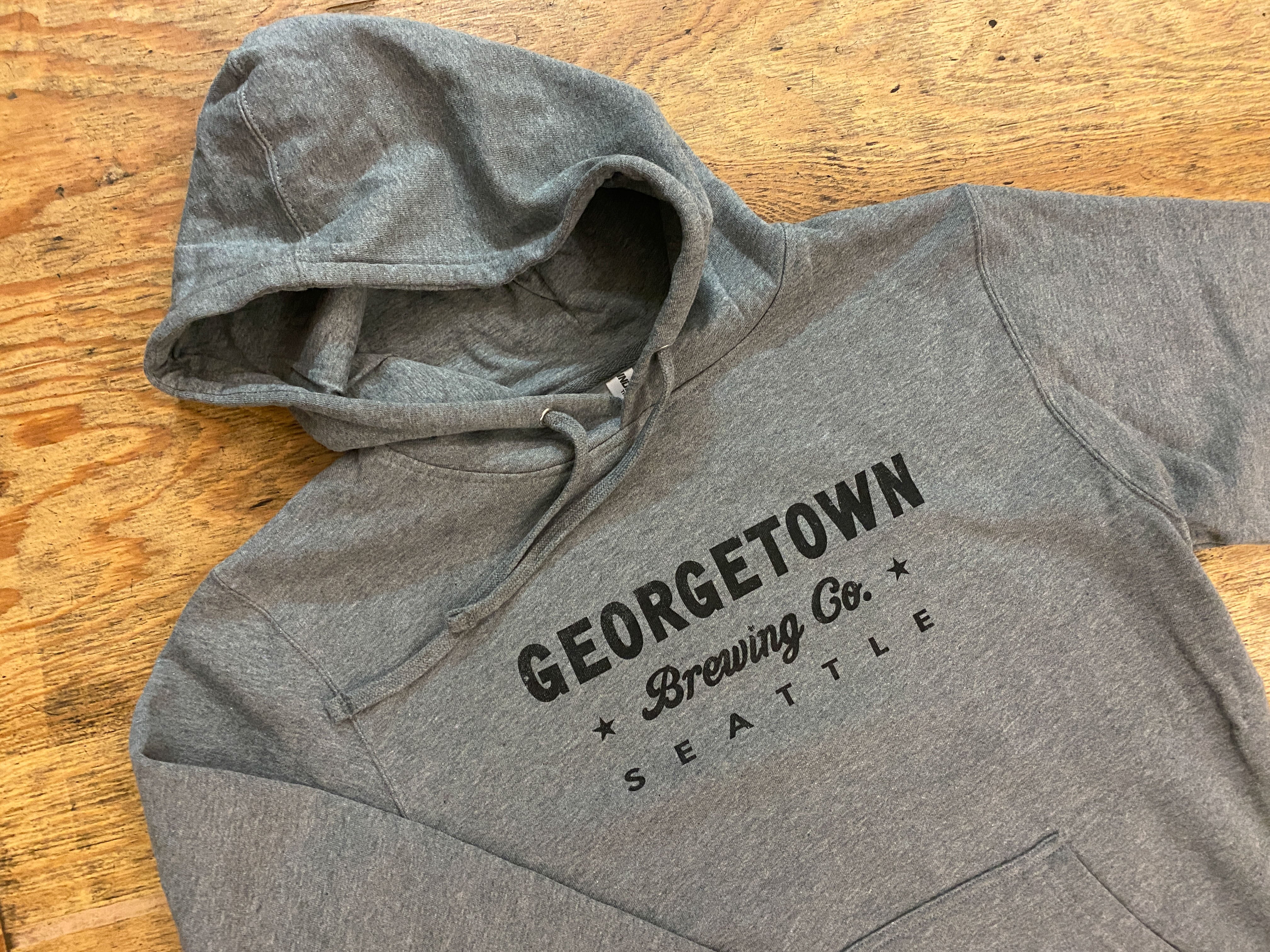 Gray hoodie with 'Georgetown Brewing Co. Seattle' text 
