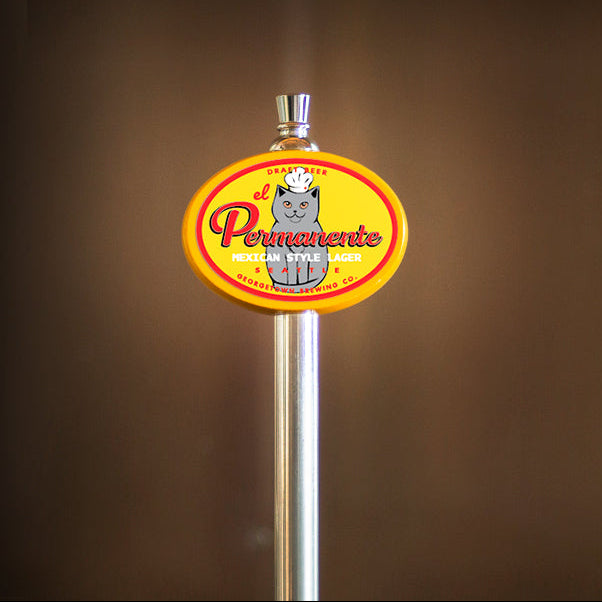 El Permanente tap handle featuring a cat in a chef hat