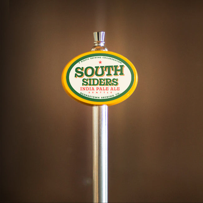yellow oval tap handle with Southsiders tap label