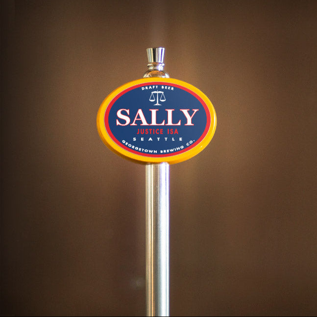 Sally brand beer tap handle on a brown background