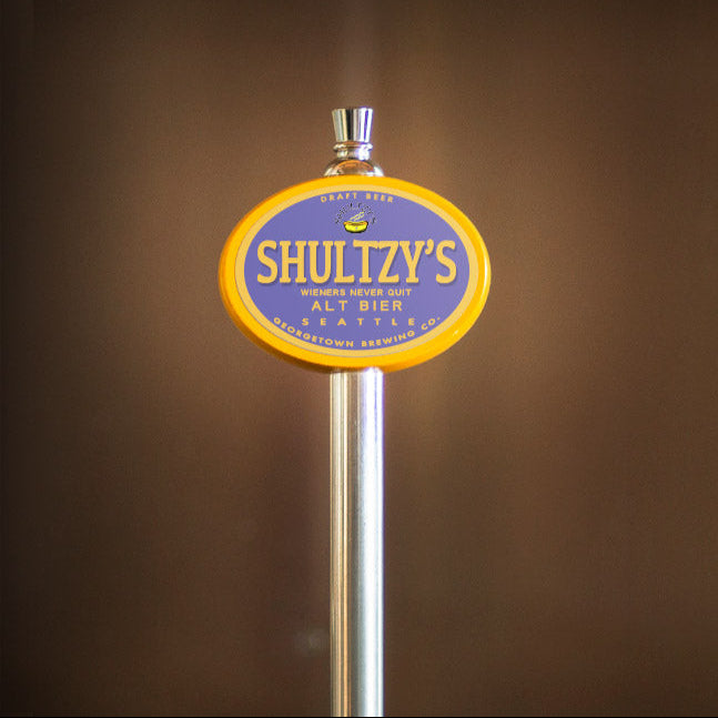 Shulitzy's beer tap handle with a blurred background