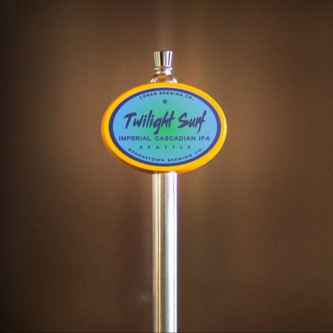 Beer tap handle with 'Twilight Surf' label against a brown background